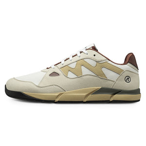 Joe Nimble Addict barfotasko i beige, brun och sandfärgad kombination. Sneakern har en bred tåbox, andningsbar ovandel i mesh och mockaliknande paneler, samt en lågprofilsdesign för naturlig fotrörelse. Synlig yttersula i beige och svart med lätt upphöjd häl.