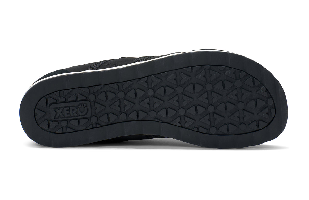 Undersidan av Xero Shoes Wynn Black – minimalistisk barfotasko i svart med retrodesign, bred tåbox och noll drop för naturlig rörelse och komfort